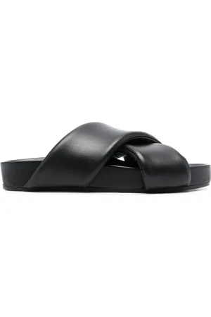 Jil Sander Flip flops con tiras cruzadas