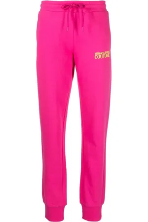 VERSACE Pants con logo estampado
