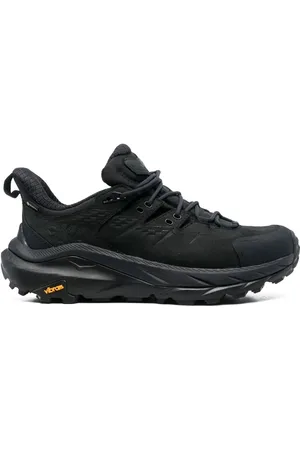 Hoka One One Tenis con agujetas y suela gruesa