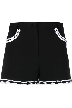 Moschino Shorts con tiro alto y ribete de encaje