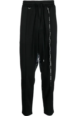 MASTERMIND Pants con estampado militar