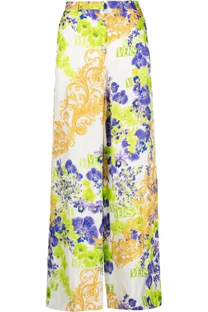 VERSACE Pantalones con estampado barroco