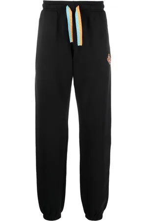 MARCELO BURLON Pants con logo bordado