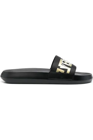 VERSACE Flip flops con puntera abierta y aplique del logo