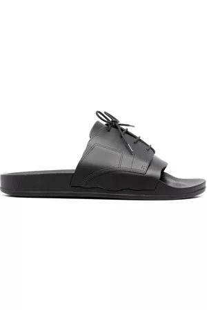 Maison Margiela Flip flops con detalle de cordones