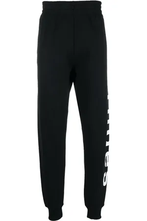 Etudes Pants con logo estampado