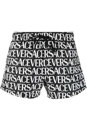 VERSACE Shorts de playa con logo estampado