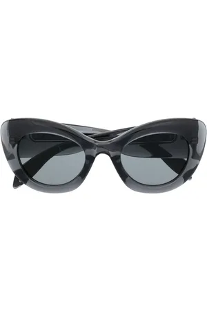 Alexander McQueen Lentes de sol con armazón cat eye transparente