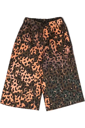 MARCELO BURLON Pants con estampado de guepardo