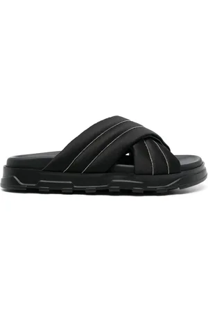 Fabiana Filippi Flip flops capitonados con tiras cruzadas