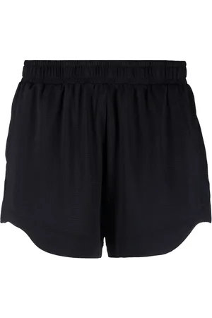 Ganni Shorts drapeados con cierre