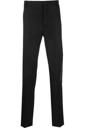 Alexander McQueen Pantalones de vestir con rayas estampadas