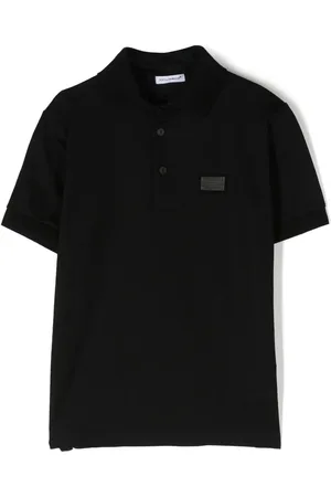 Dolce & Gabbana Playera tipo polo con placa del logo