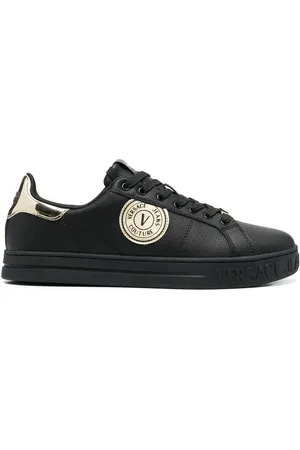 VERSACE Tenis bajos con parche del logo