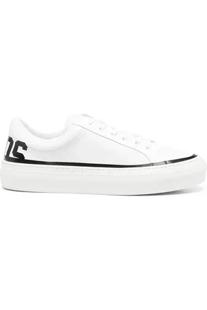 GCDS Tenis bajos con logo estampado