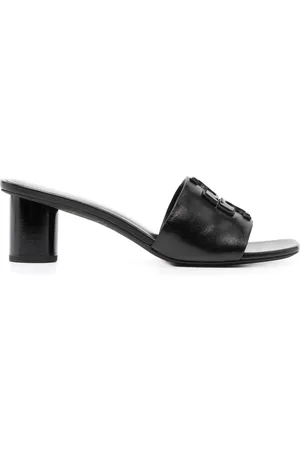 Tory Burch Mules con parche del logo y tacón de 60mm