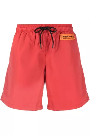Heron Preston Shorts de playa con parche del logo y cordones en la pretina