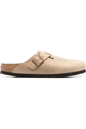 Birkenstock Botas con puntera redonda y detalle de hebilla