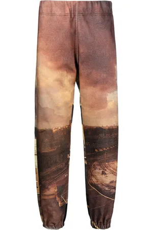 UNDERCOVER Pants estampados