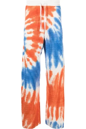 MARCELO BURLON Pantalones con motivo tie-dye