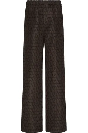 VALENTINO GARAVANI Pantalones anchos con estampado VLogo