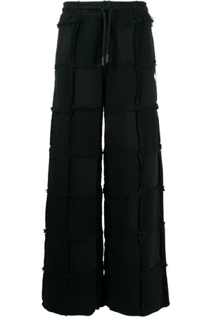 MARCELO BURLON Pantalones con cordones en la pretina
