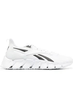 Reebok Tenis bajos con parche del logo