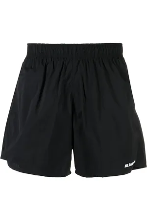 Jil Sander Shorts de playa con logo estampado