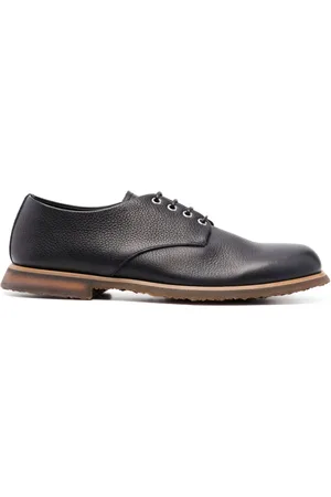 Premiata Zapatos derby con efecto texturizado