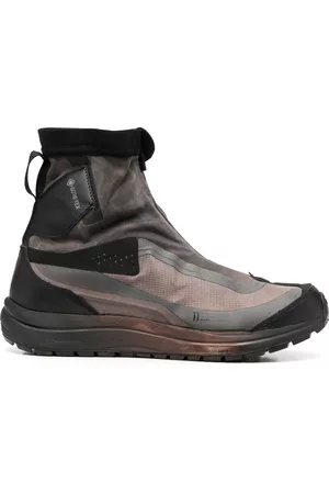 11 BY BORIS BIDJAN SABERI Botines con paneles y efecto envejecido