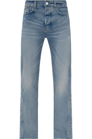 AMIRI Jeans acampanadas con detalles de cristal
