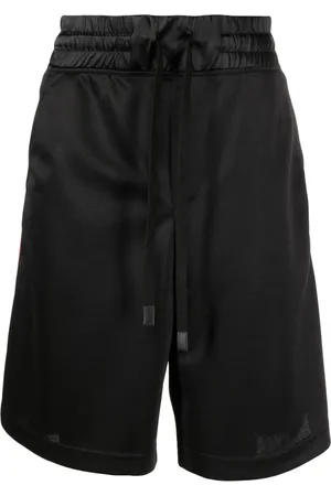VERSACE Shorts con logo en relieve