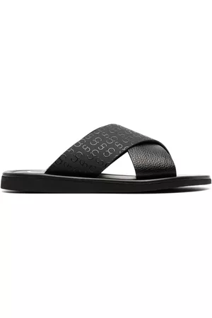 Casadei Flip flops con monograma en relieve