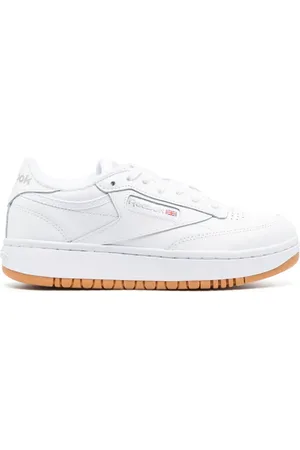 Reebok Tenis bajos con parche del logo