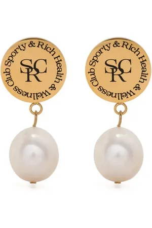 Sporty & Rich Aretes con botón del logo