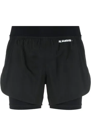 Jil Sander Shorts con capas y logo estampado