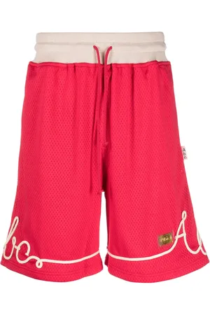 ADVISORY BOARD CRYSTALS Shorts deportivos con aplique del logo