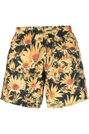 Jil Sander Shorts de playa con girasoles estampados