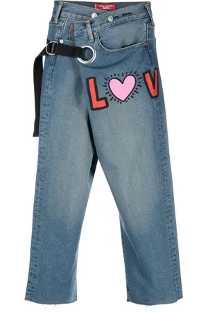 JUNYA WATANABE Jeans corto con estampado gráfico