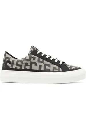 GCDS Tenis bajos con logo estampado
