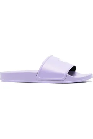 MARCELO BURLON Flip flops con logo en relieve