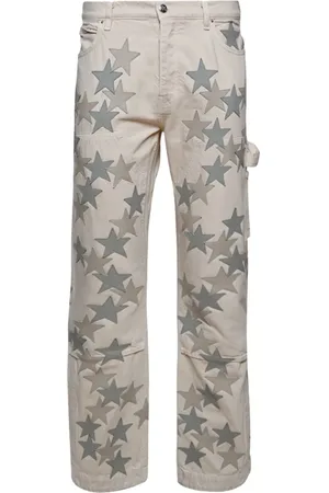 AMIRI Pantalones rectos con estrellas estampadas