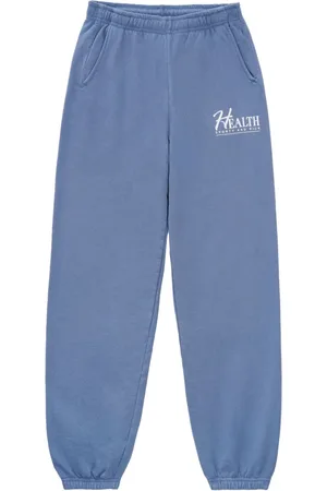 Sporty & Rich Pants con eslogan estampado