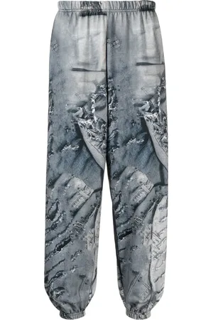 Natasha Zinko Pants con logo estampado