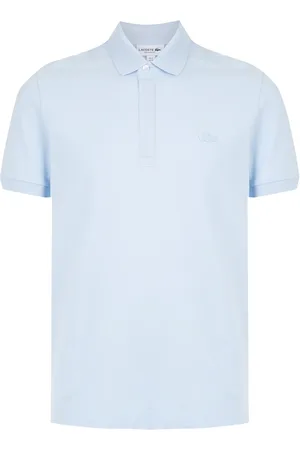 Lacoste Playera tipo polo con parche del logo