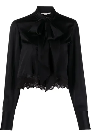Stella McCartney Blusa manga larga con moño en el cuello
