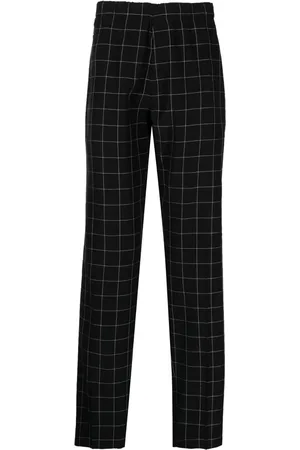 UNDERCOVER Pantalones con cuadros estampados