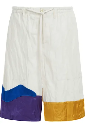 Marni Shorts con drop crotch y estampado gráfico