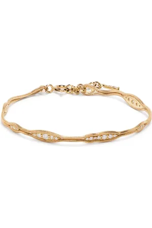 Fernando Jorge Pulsera Fluid en oro amarillo de 18kt con diamantes
