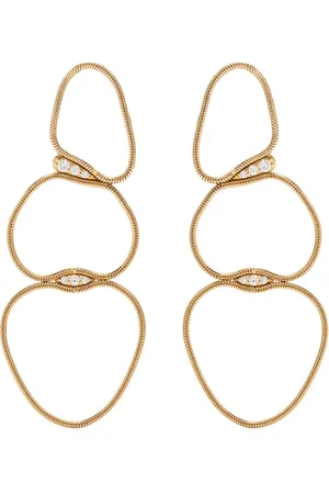 Fernando Jorge Aretes Fluid en oro amarillo de 18kt con diamantes